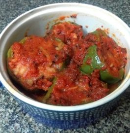 Stuffed Capsicum In Tomato Gravy Recipe