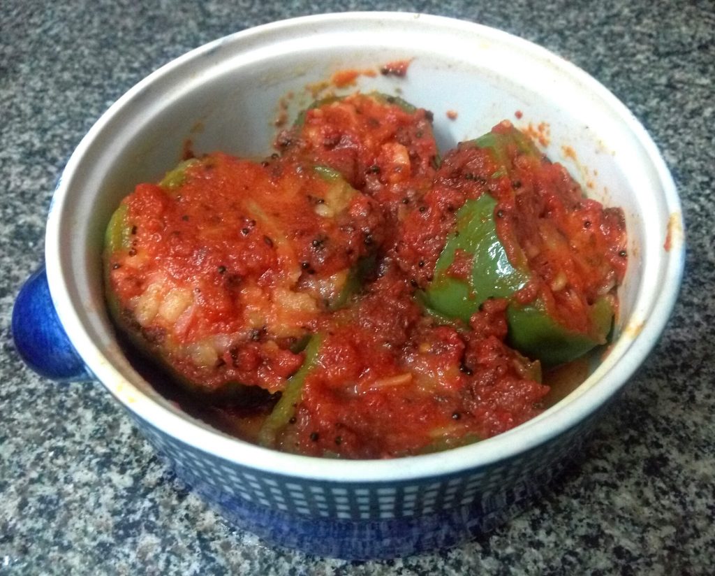 Stuffed Capsicum In Tomato Gravy Recipe